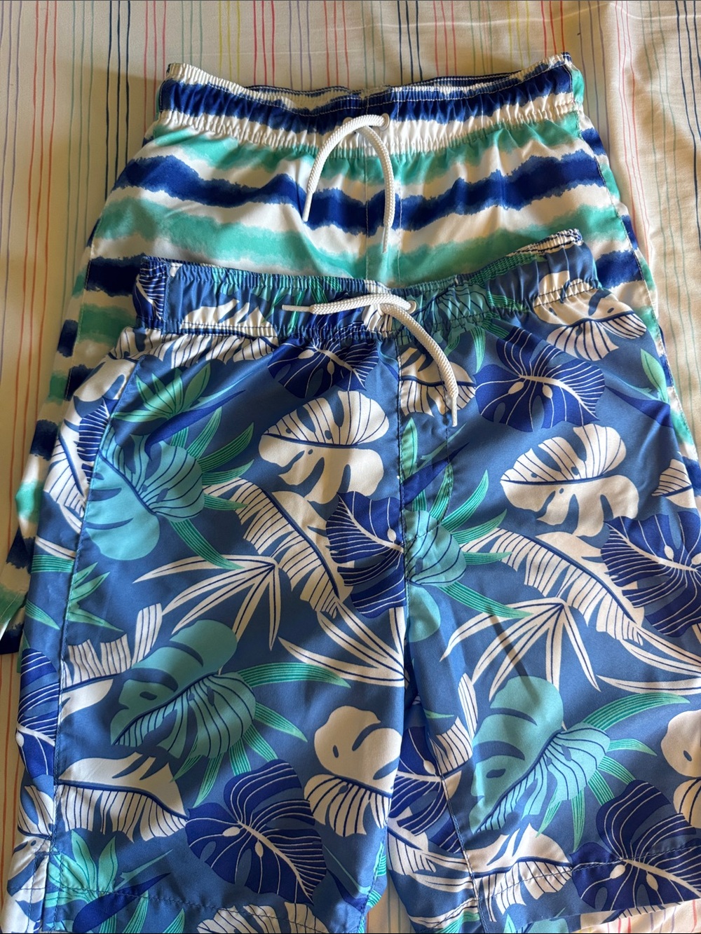 Boy’s Blue Tropical Print Swim Trunks